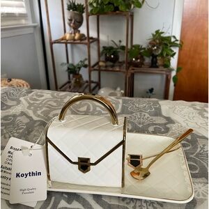 This is a porcelain cup , tray and spoon.